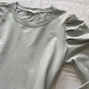 Pretty pale blue sweatshirt with puff sleeves. Basic By Design. Size medium.